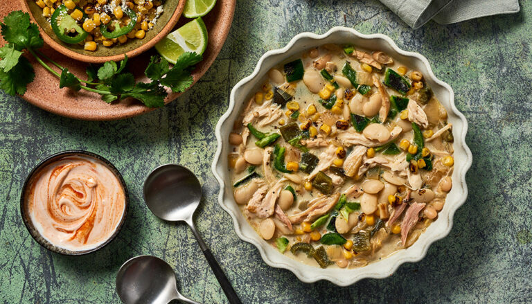 A white bowl of white bean chicken chili